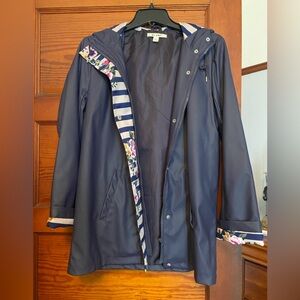 Navy blue hooded raincoat with pretty floral accents size small